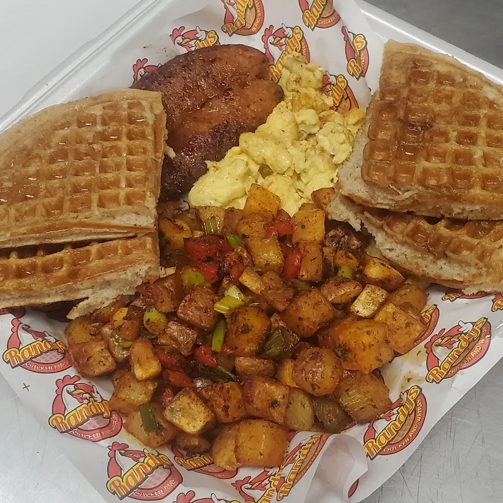 Fruity Pebble Breakfast with 1 Fruity Pebble Waffle Home Fries 2 Eggs & 1 Link